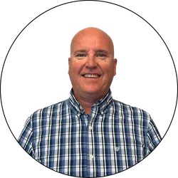 Professional headshot of Corey Biddlecombe, Owner.
